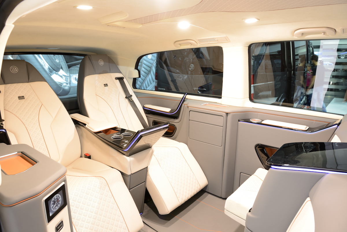 luxury travel van interior with leather recliner chairs